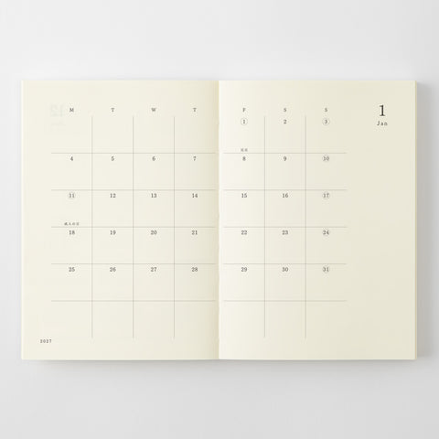Midori Diary A6 2027 med månedsplanlegger, linjerte notatsider og blanke sider i A6-format.