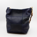 Ruth veske fra PAP i skinn og semsket skinn med flettede håndtak