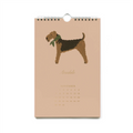 Dog of the Month veggkalender 2027 fra Rifle Paper Co. med illustrerte hunder