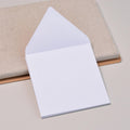 Hvite E56-konvolutter Bright White fra Stefan Papir, 10 stk