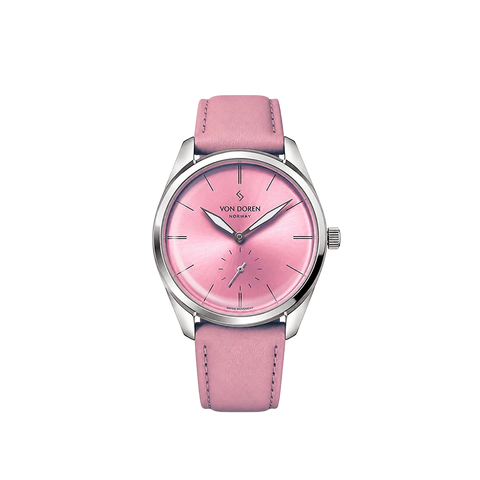 Runde Pale Pink klokke fra Von Doren med rosa sunburst-skive og matchende skinnreim